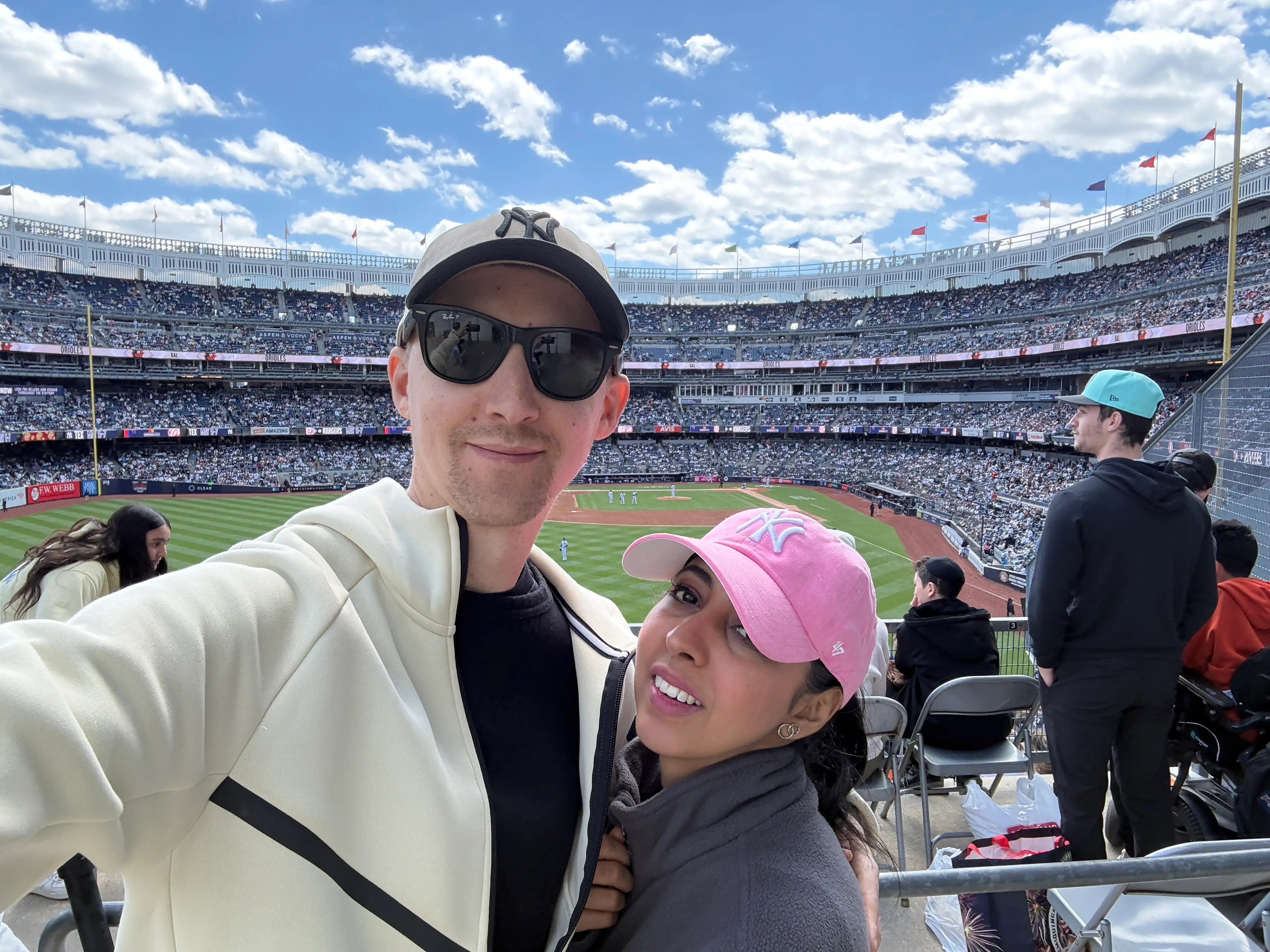 Ethan Lazuk and Dania Lazuk at a New York Yankees game.
